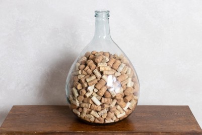 large carboy bottle with corks